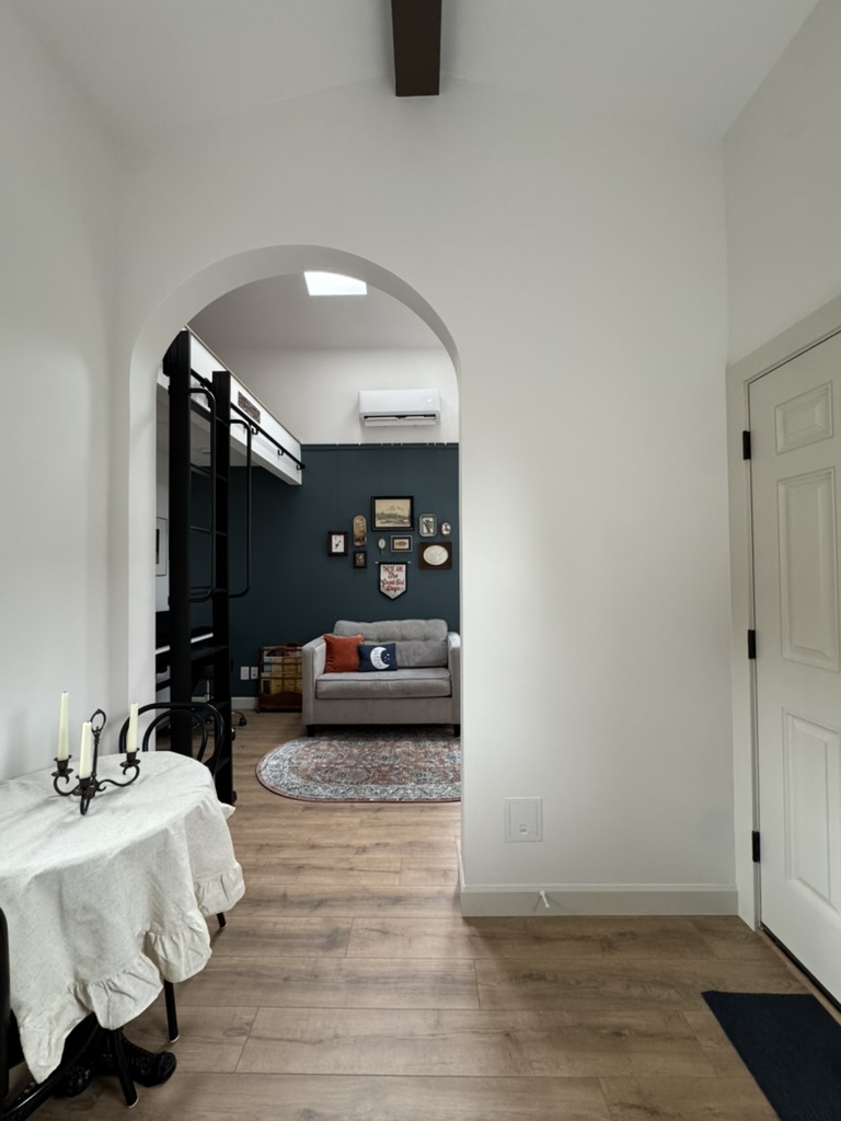 Archway view looking through to the living area of the 262 sqft tiny house ADU in Kent, WA